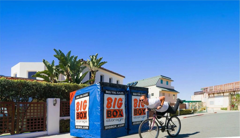 San Diego storage customer in front of Big Box Storage boxes