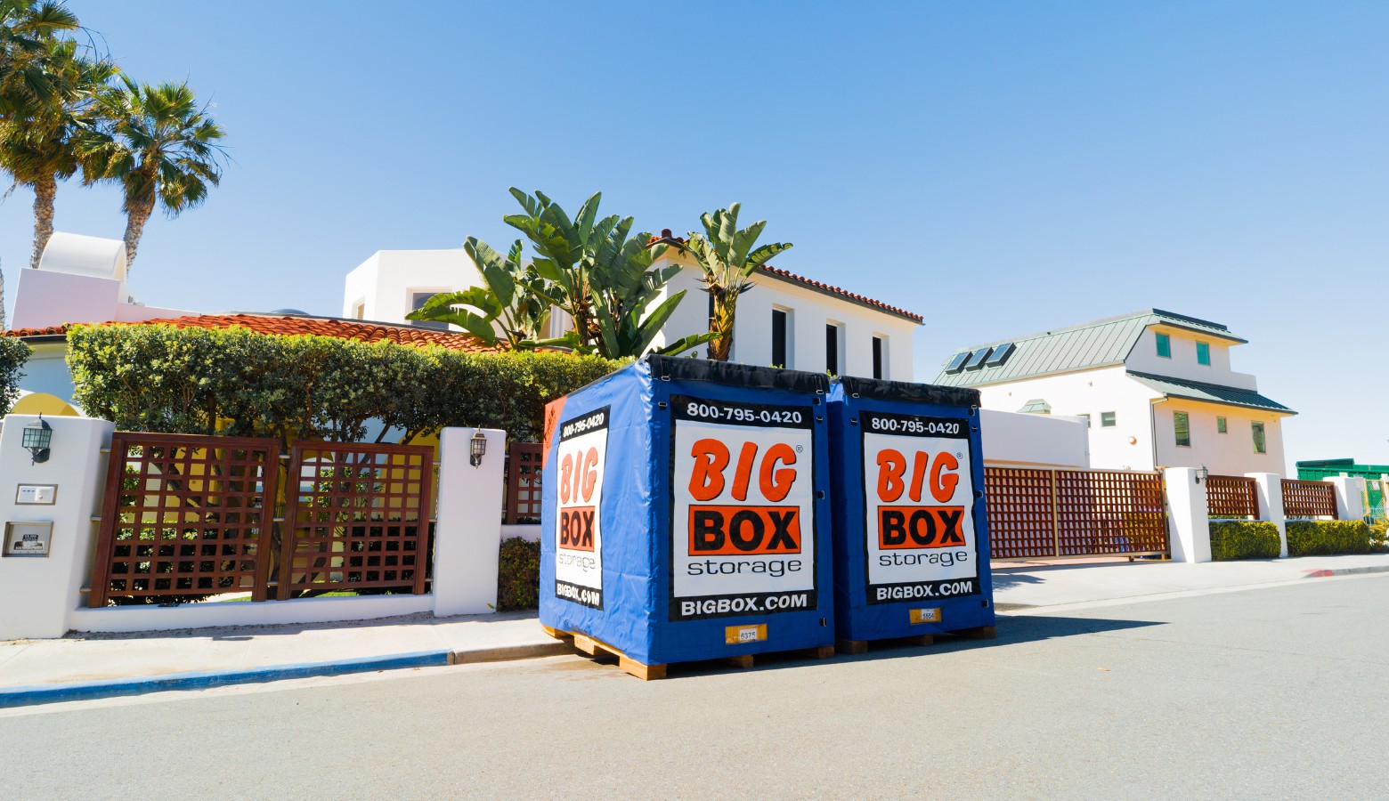 Two Big Box storage units on a street in San Diego